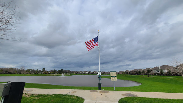 25' x 5'' x .125'' 1-pc. tapered aluminum commercial flagpole. Windloading at 136 MPH unflagged.