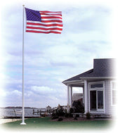 25' x 4'' x .125" tapered aluminum flagpole. Windloading at 106 MPH unflagged.