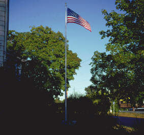 25' x 5'' x .156'' 1-pc. tapered aluminum commercial flagpole. External model windloading at 178 MPH unflagged.